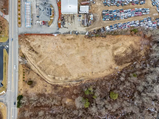 a view of a house with a tree
