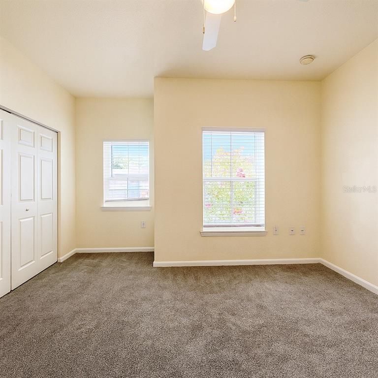 4877 Northwest 42nd Road, Unit 106 Gainesville, FL 32606 - Photo 13 of 27 an empty room with a window