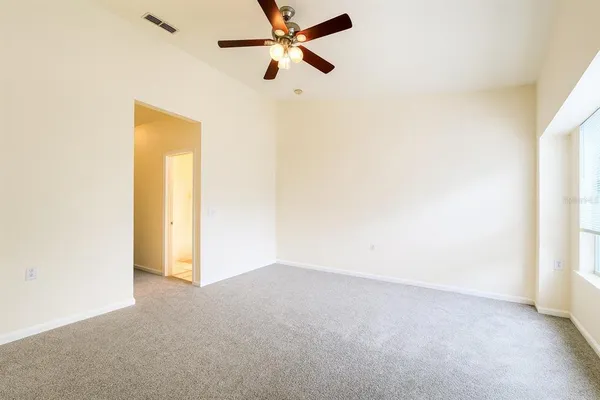 a view of a big room with carpet