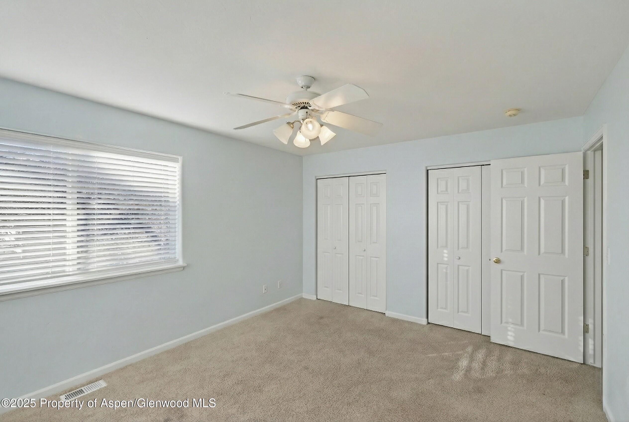 830 Donegan Road, Unit D Glenwood Springs, CO 81601 - Photo 18 of 21 a view of an empty room with a window