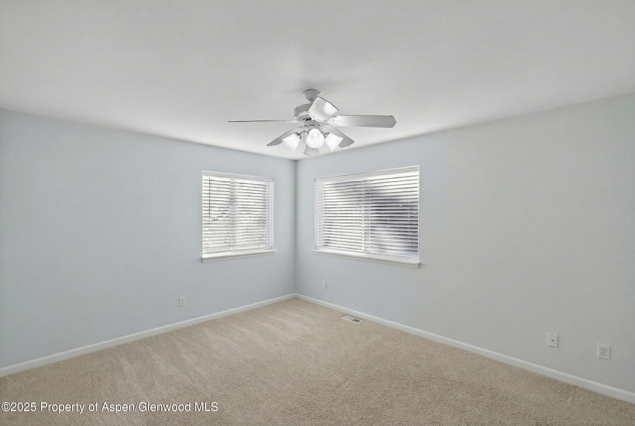 830 Donegan Road, Unit D Glenwood Springs, CO 81601 - Photo 19 of 21 a view of an empty room with a window