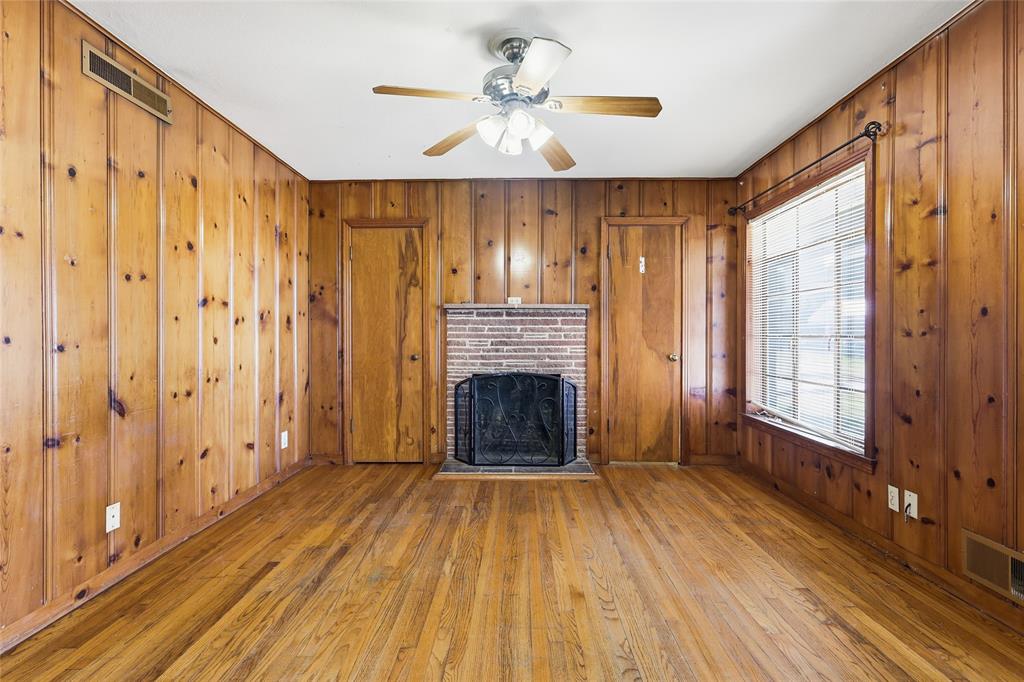 1822 West Hickory Street Denton, TX 76201 - Photo 8 of 20 a view of livingroom with hardwood floor and a ceiling fan