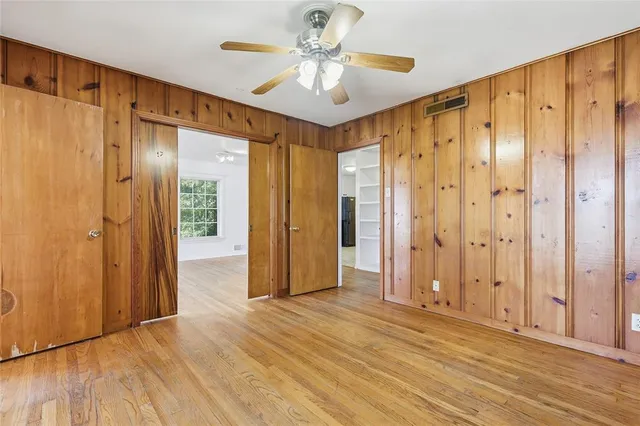 a view of a bathroom with closet area
