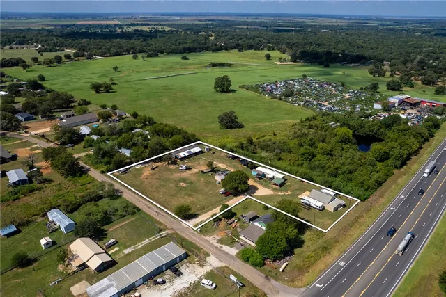 a view of swimming pool with a yard