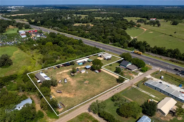 a view of a house with a big yard