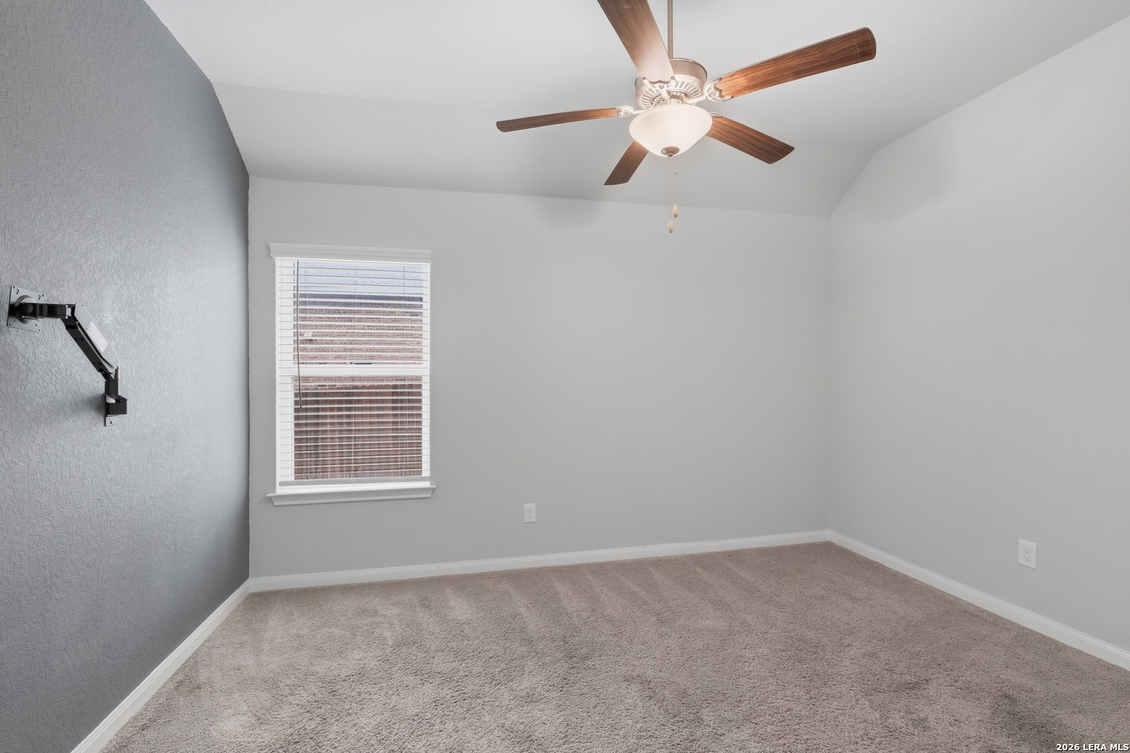 32125 Cardamom Way Bulverde, TX 78163 - Photo 16 of 32 an empty room with windows and fan