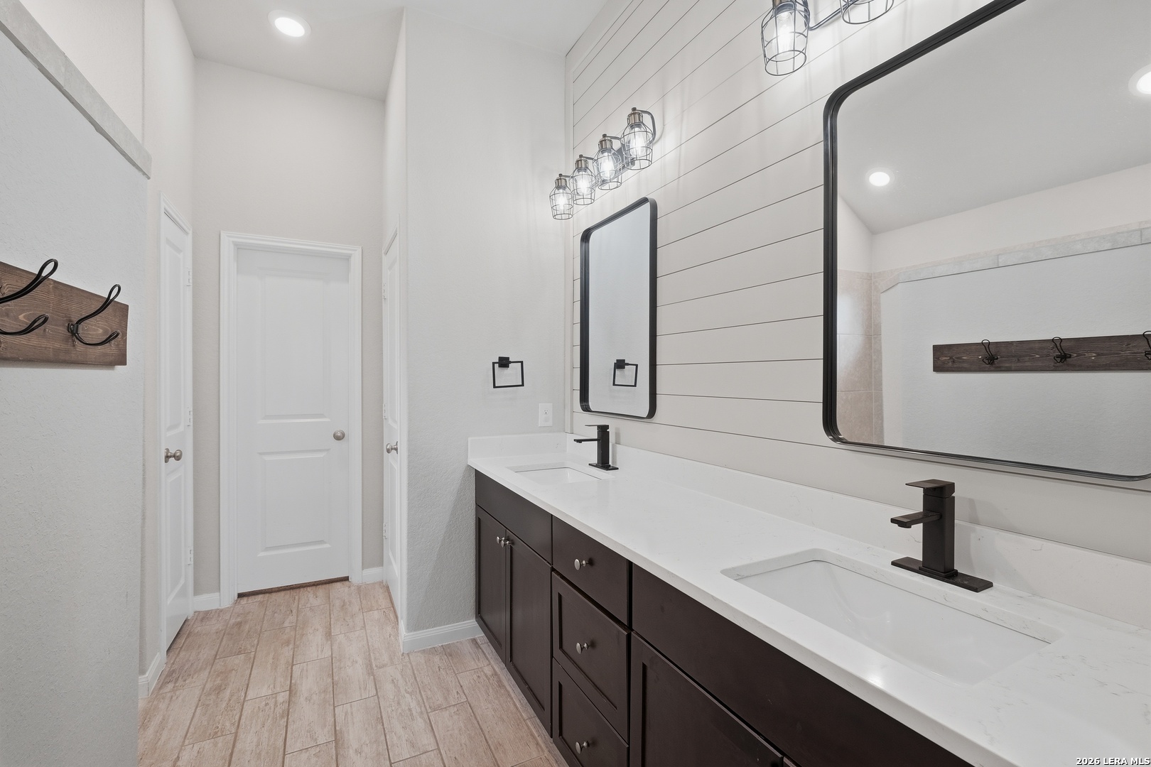 32125 Cardamom Way Bulverde, TX 78163 - Photo 25 of 32 a spacious bathroom with a sink and a mirror