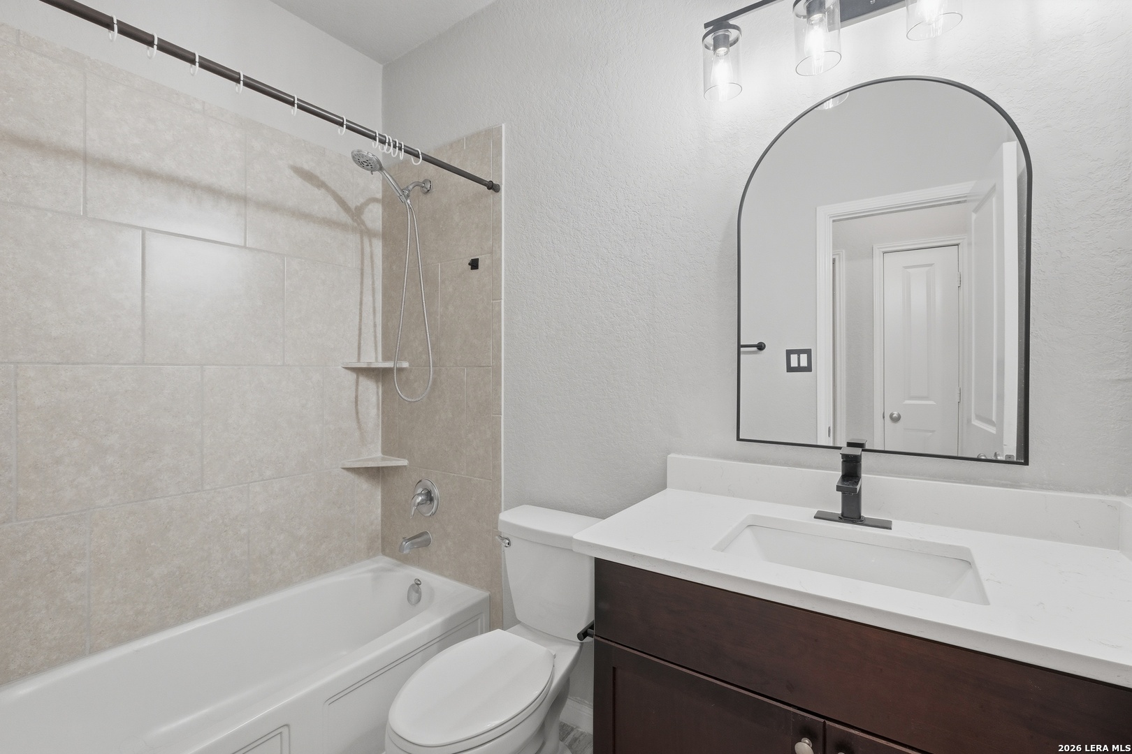 32125 Cardamom Way Bulverde, TX 78163 - Photo 26 of 32 a bathroom with a sink a toilet and shower