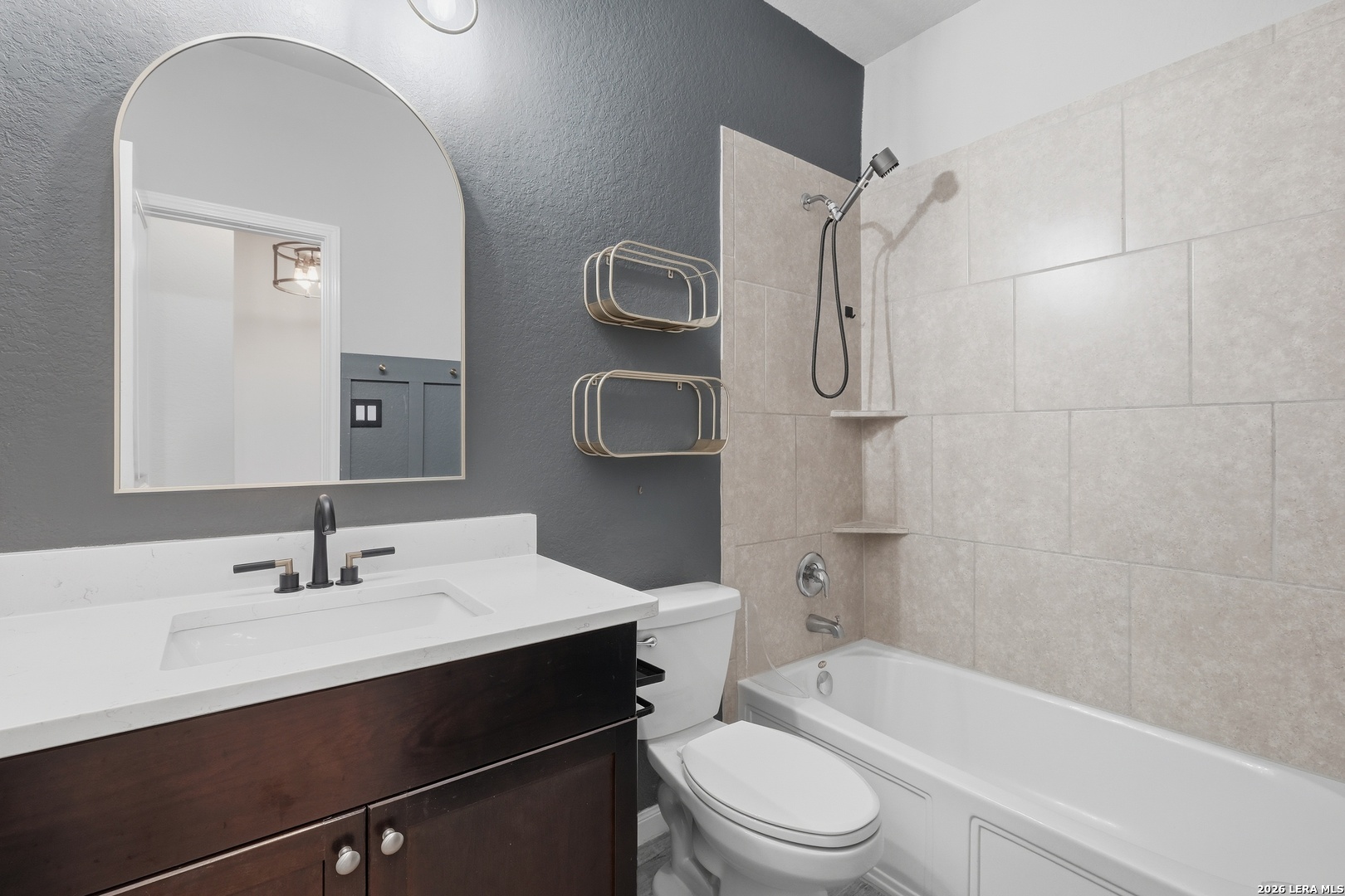 32125 Cardamom Way Bulverde, TX 78163 - Photo 27 of 32 a bathroom with a sink a toilet and shower
