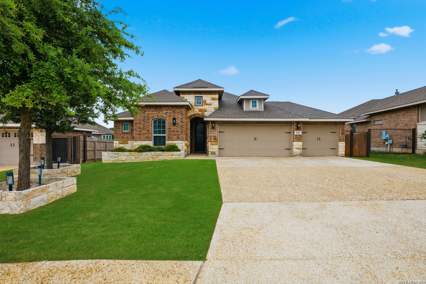 32125 Cardamom Way Bulverde, TX 78163 - Photo 4 of 32 a front view of a house with a yard