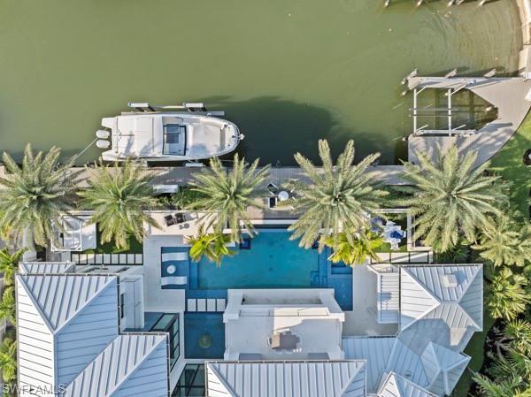 2201 Shad Court Naples, FL 34102 - Photo 21 of 25 a view of a house with balcony