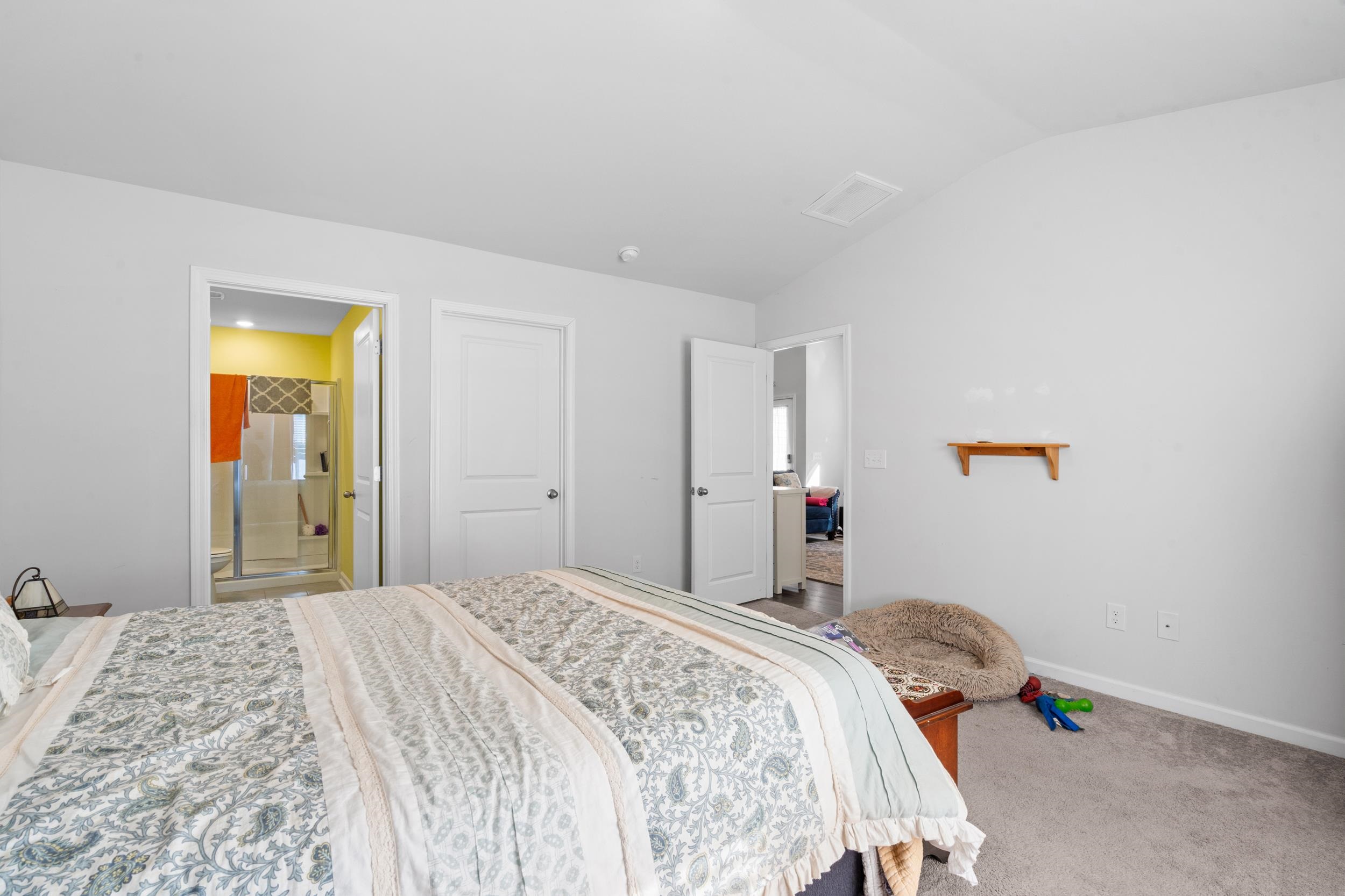 1404 Jardine Loop Little River, SC 29566 - Photo 17 of 31 Carpeted bedroom with lofted ceiling and baseboards