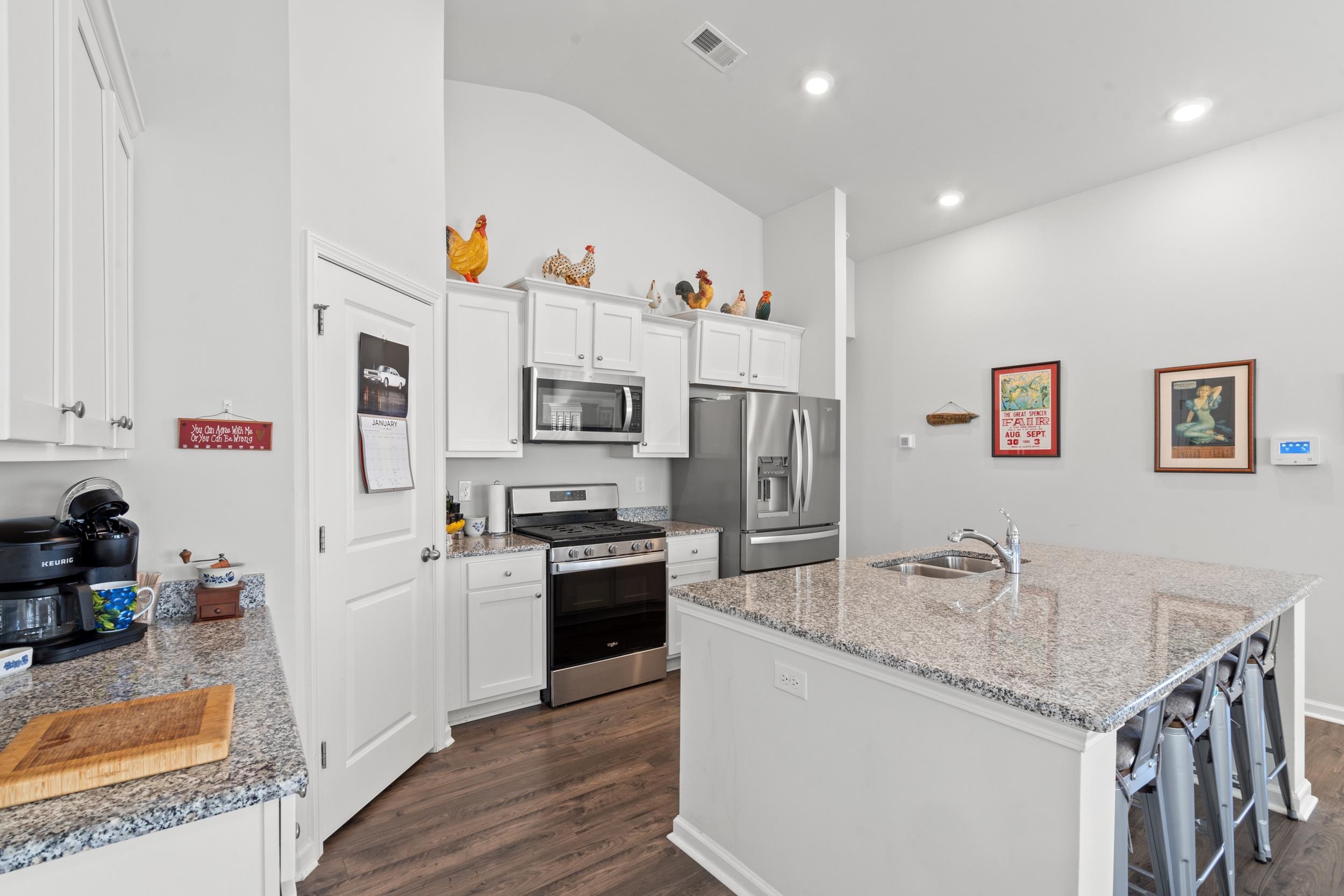 1404 Jardine Loop Little River, SC 29566 - Photo 20 of 31 Bedroom with light colored carpet and vaulted ceiling