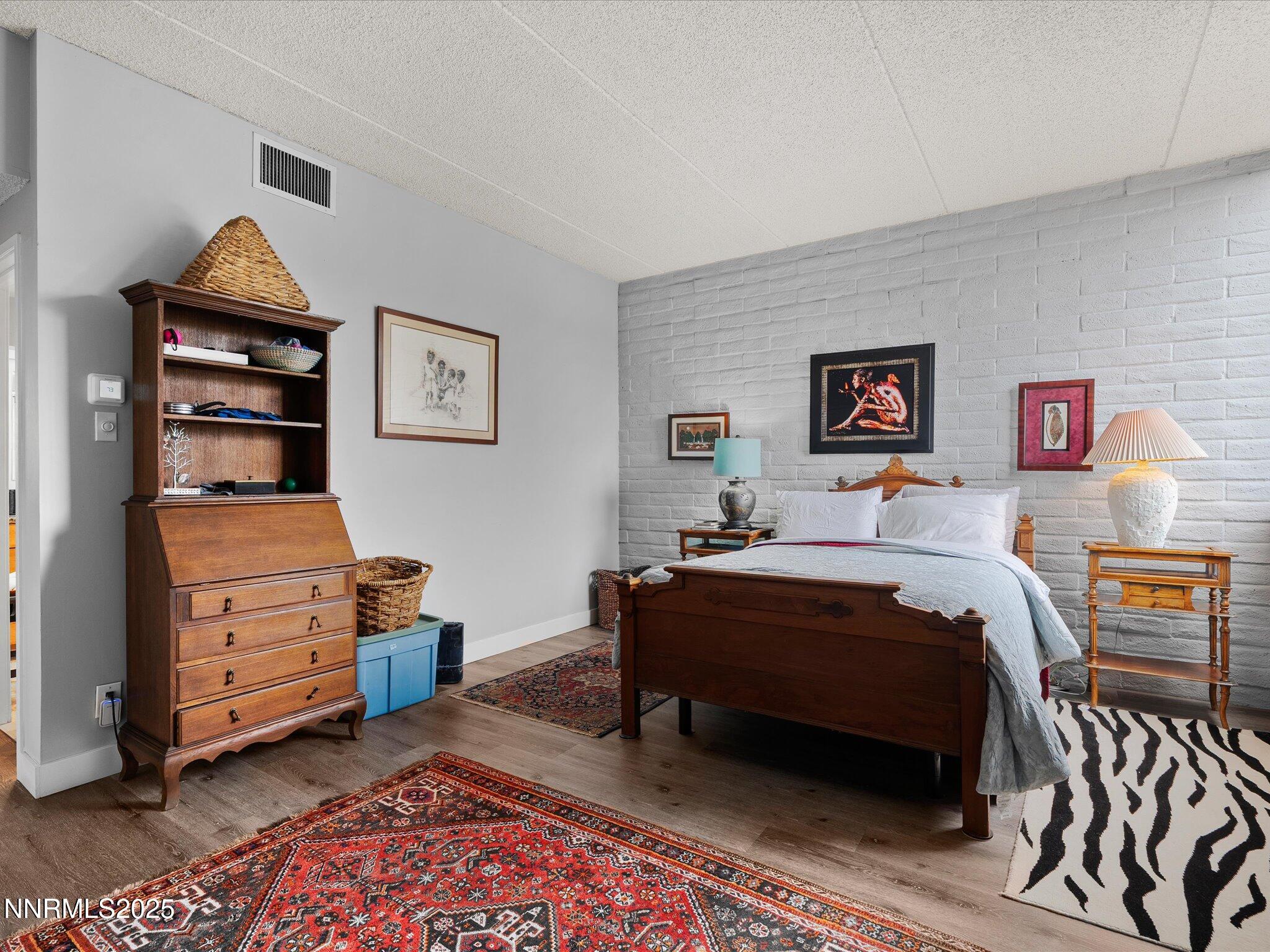 1200 Riverside Drive, Unit 1276 Reno, NV 89503 - Photo 26 of 47 a bedroom with a bed and a closet