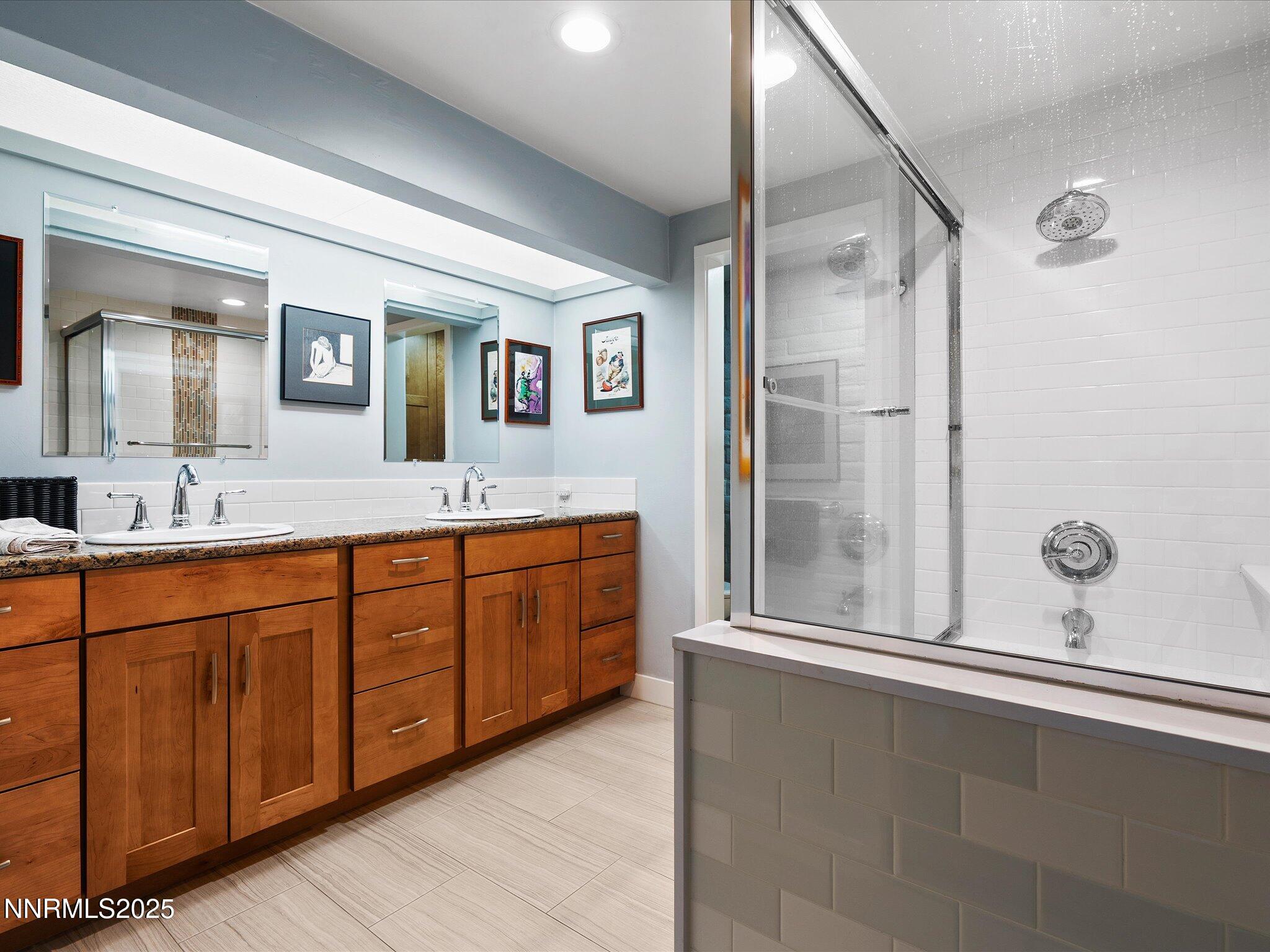 1200 Riverside Drive, Unit 1276 Reno, NV 89503 - Photo 28 of 47 a bathroom with a double vanity sink mirror and double