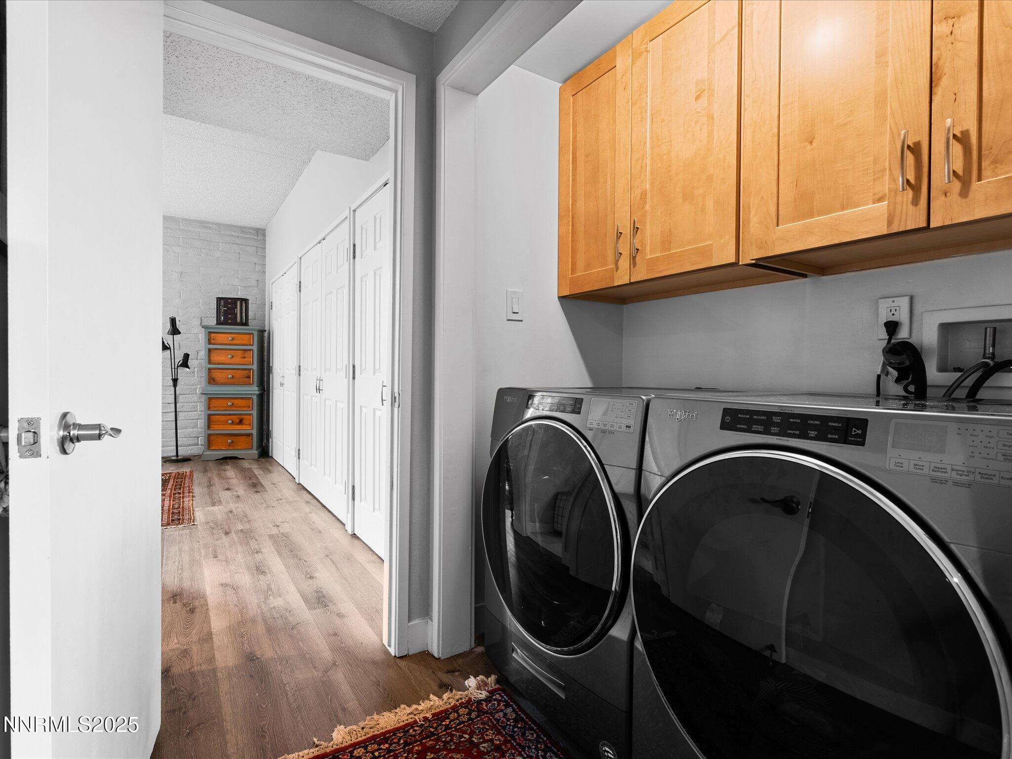 1200 Riverside Drive, Unit 1276 Reno, NV 89503 - Photo 35 of 47 a view of a storage and utility room with washer and dryer