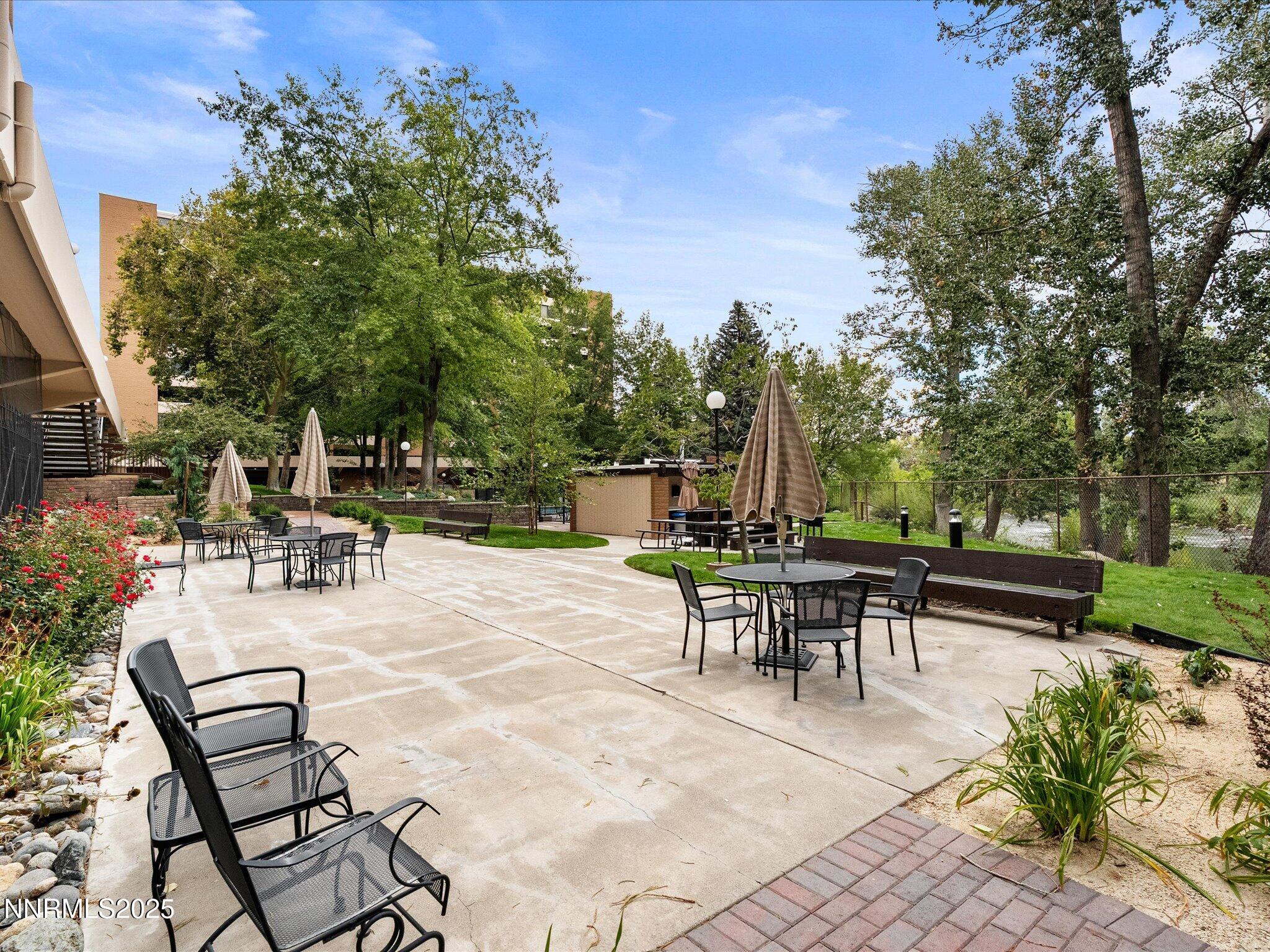 1200 Riverside Drive, Unit 1276 Reno, NV 89503 - Photo 40 of 47 a view of a tables and chairs in the patio