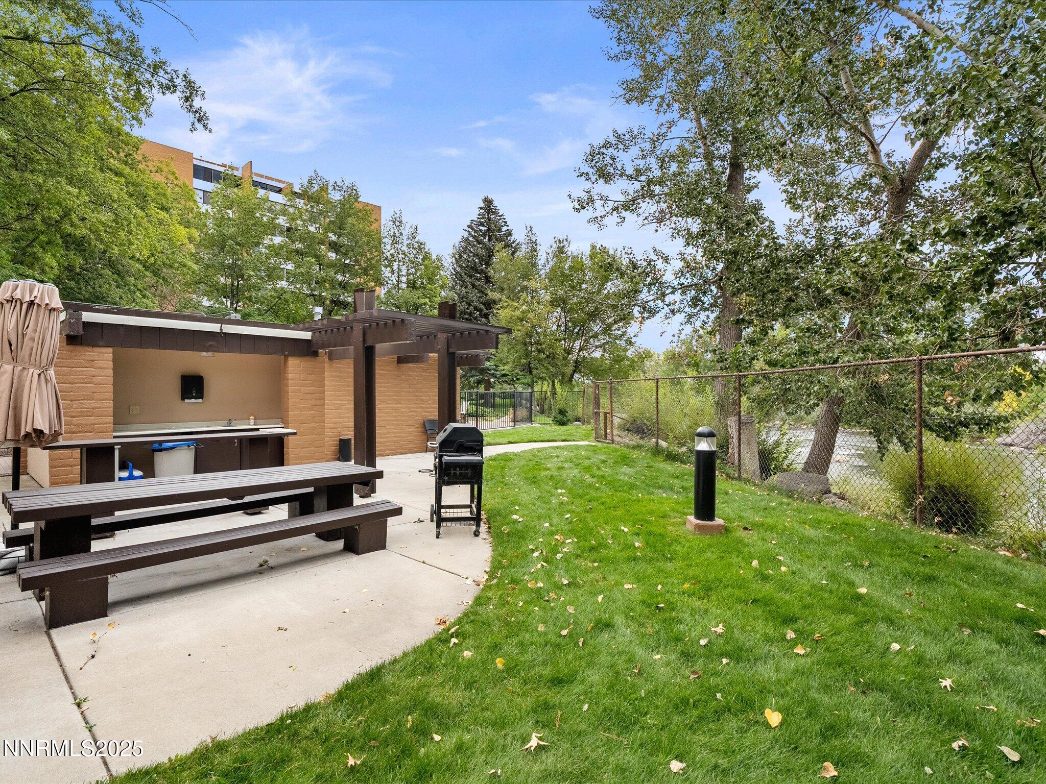 1200 Riverside Drive, Unit 1276 Reno, NV 89503 - Photo 43 of 47 a view of a backyard with a garden and seating area