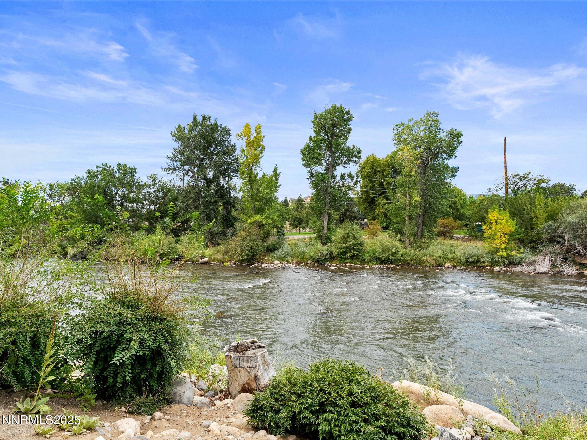1200 Riverside Drive, Unit 1276 Reno, NV 89503 - Photo 45 of 47 a view of a lake with beach and green space
