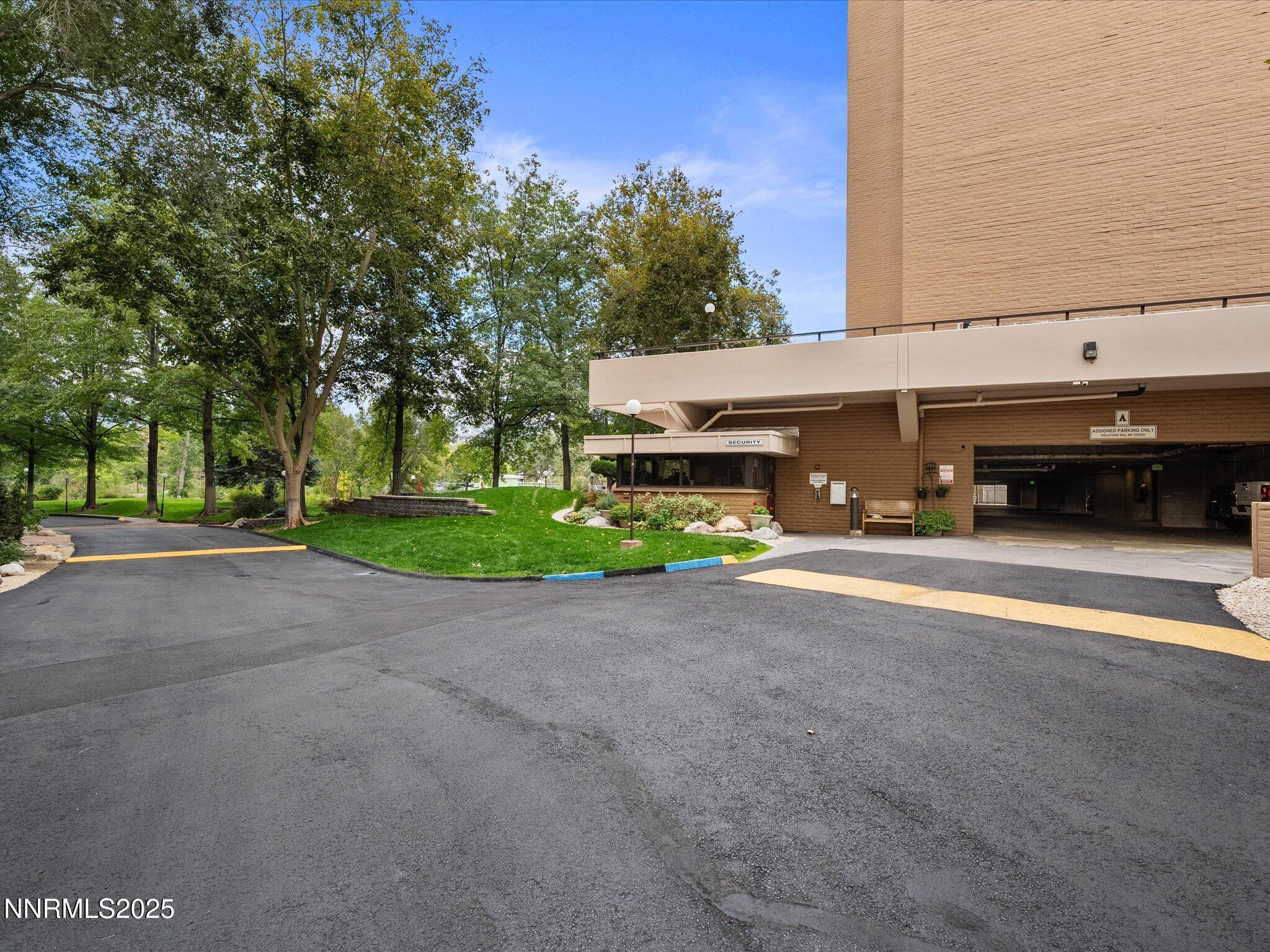 1200 Riverside Drive, Unit 1276 Reno, NV 89503 - Photo 47 of 47 a car parked in front of a building with trees