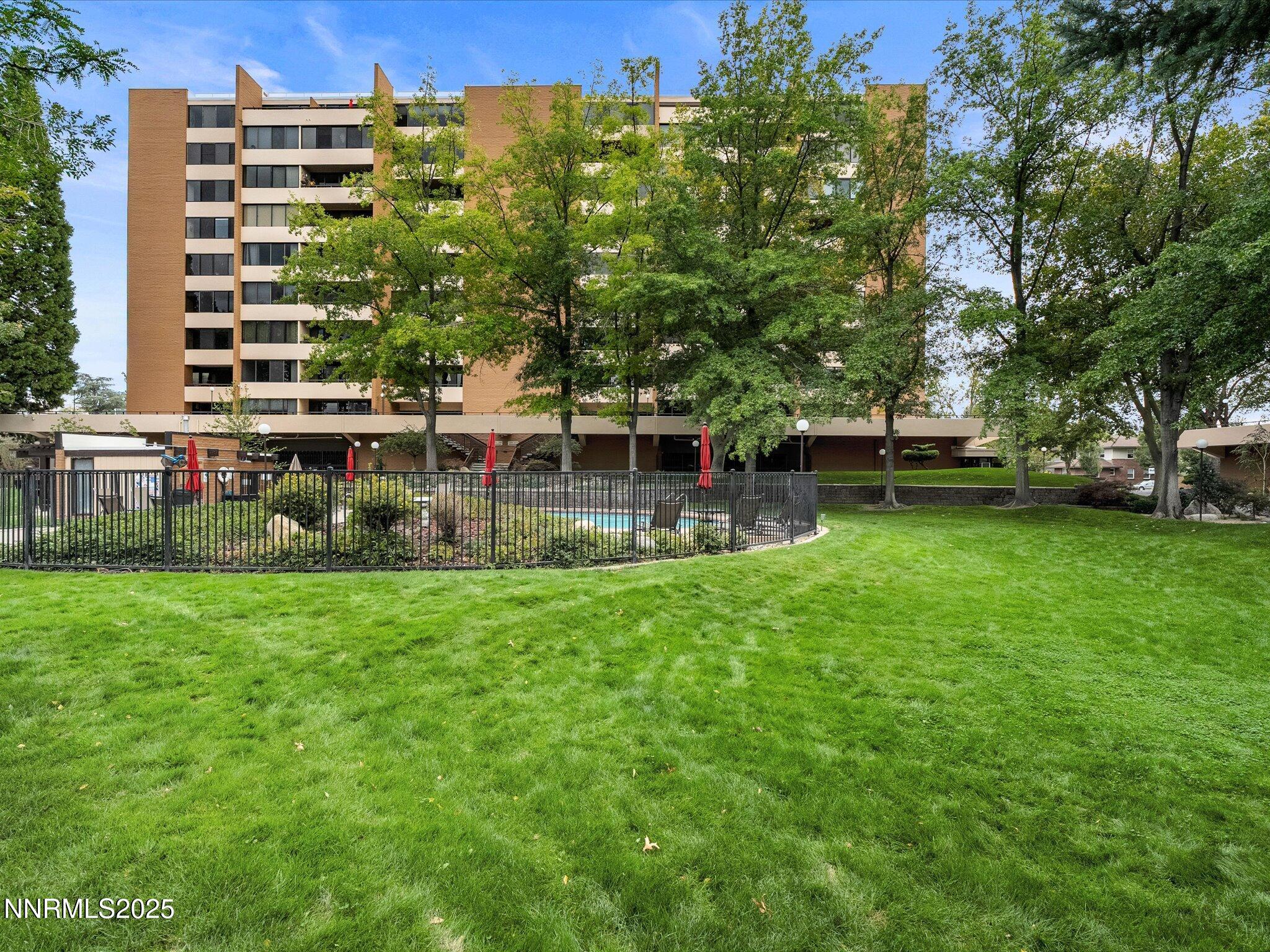 1200 Riverside Drive, Unit 1276 Reno, NV 89503 - Photo 5 of 47 a view of a house with a backyard porch and sitting area