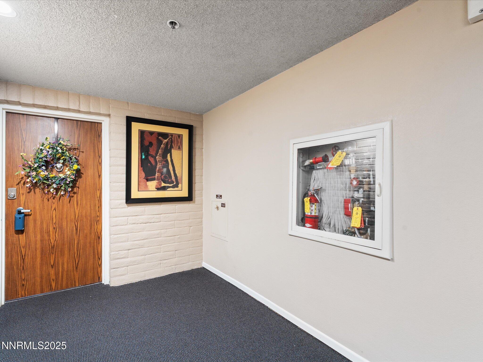 1200 Riverside Drive, Unit 1276 Reno, NV 89503 - Photo 8 of 47 a view of a hallway with workspace