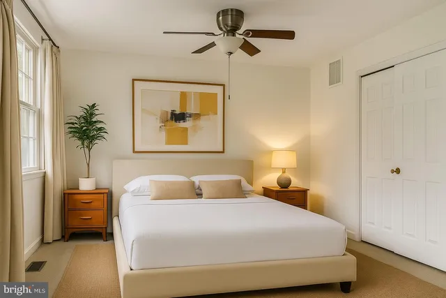 a bedroom with a bed and a walk in closet