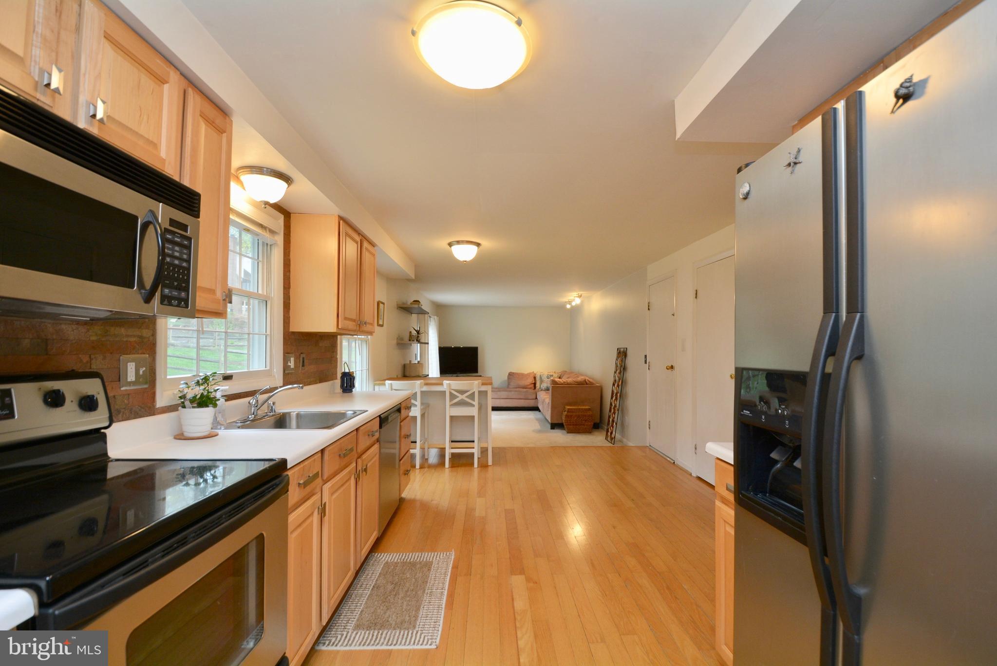 5167 Eliots Oak Road Columbia, MD 21044 - Photo 11 of 41 Open Kitchen for all the hands cooking.