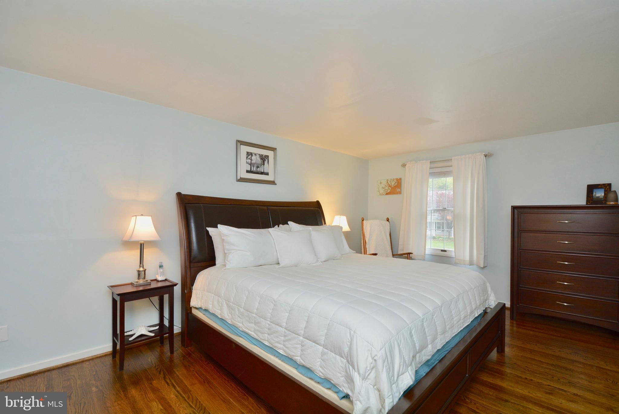 5167 Eliots Oak Road Columbia, MD 21044 - Photo 20 of 41 Master Bedroom with Hardwood Floors
