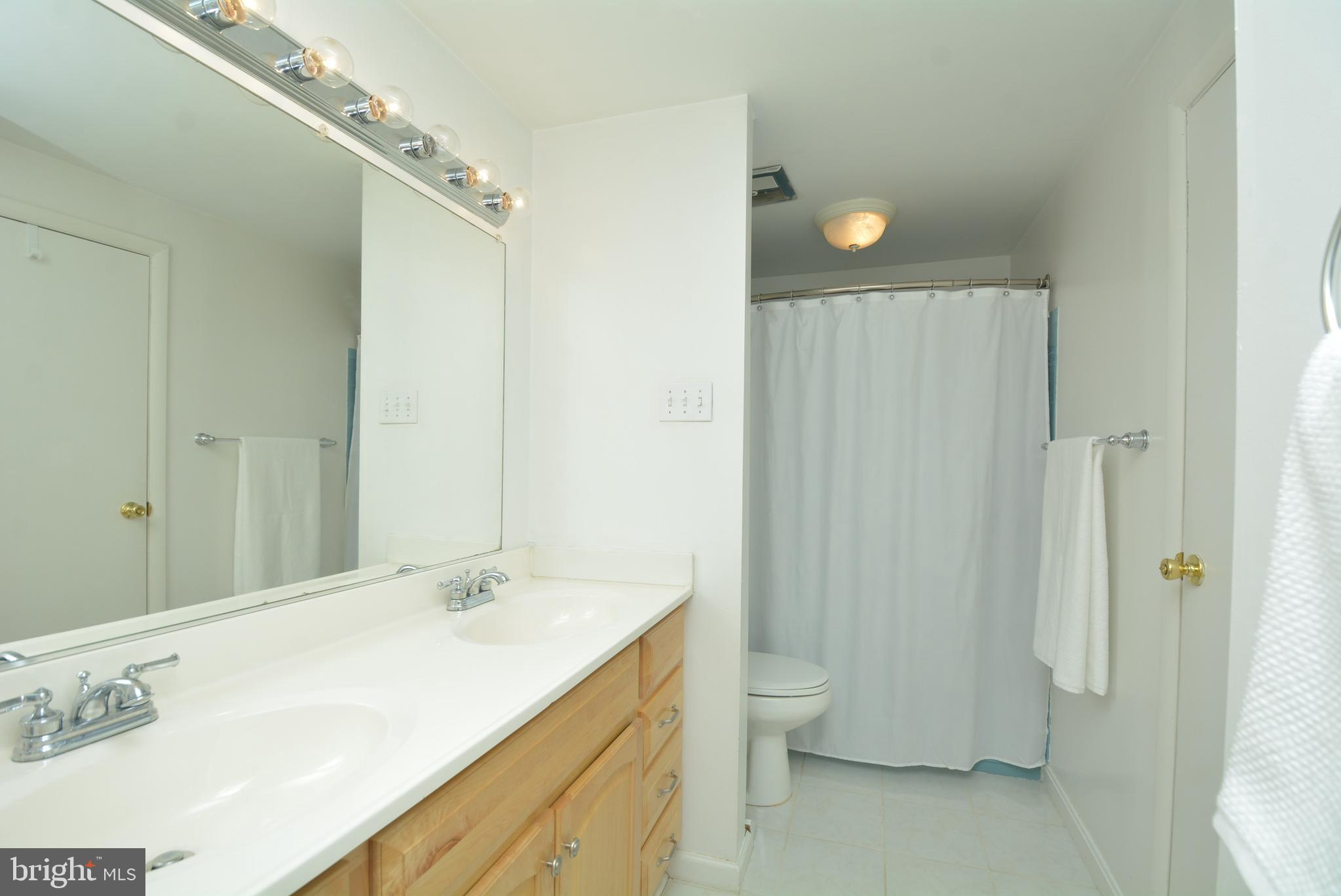 5167 Eliots Oak Road Columbia, MD 21044 - Photo 31 of 41 Double Sink Hall Bath