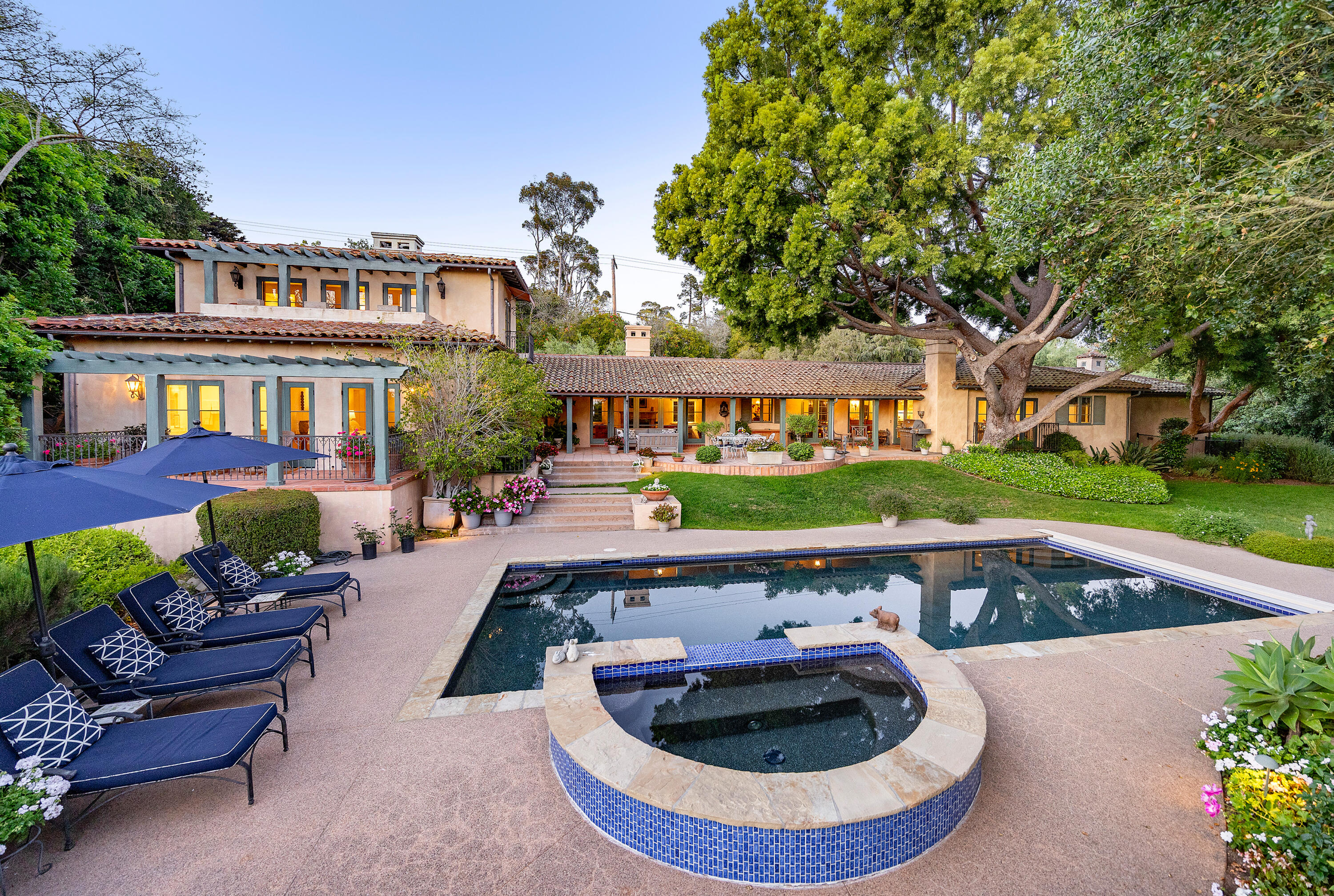1029 Alston Road Montecito, CA 93108 - Photo 4 of 24 a view of swimming pool with outdoor seating and trees in the background