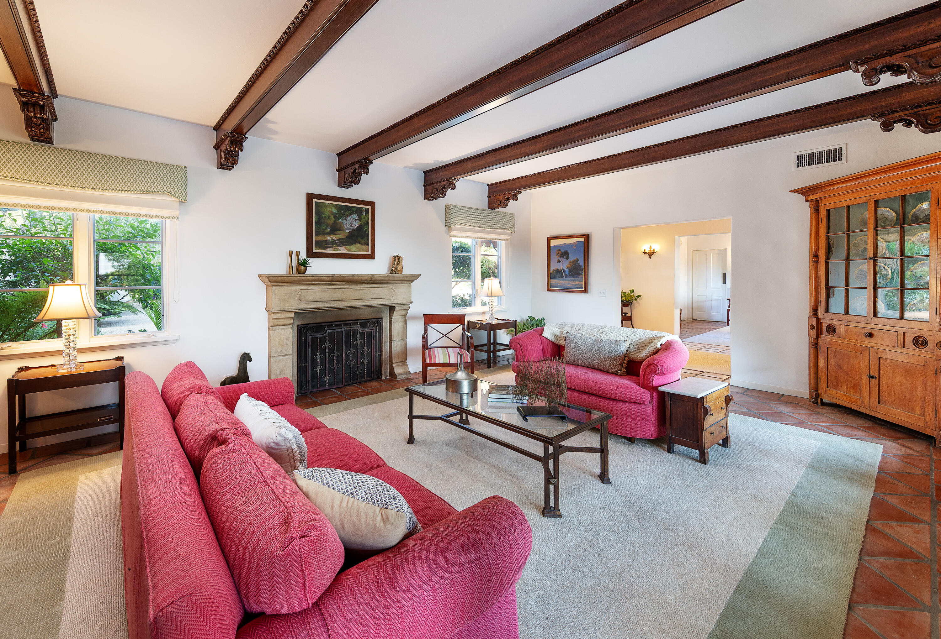 1029 Alston Road Montecito, CA 93108 - Photo 5 of 24 a living room with furniture fireplace and a large window