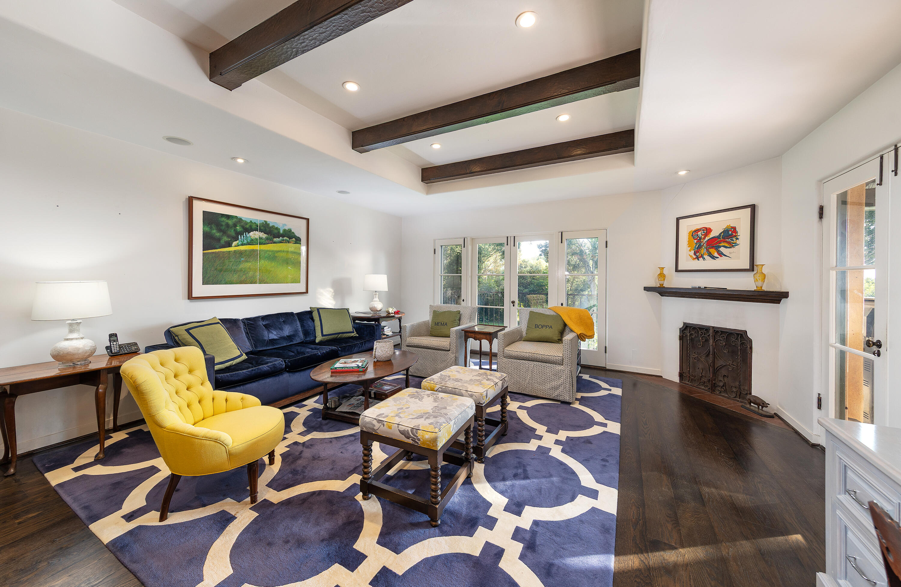 1029 Alston Road Montecito, CA 93108 - Photo 8 of 24 a living room with fireplace furniture rug and wooden floor