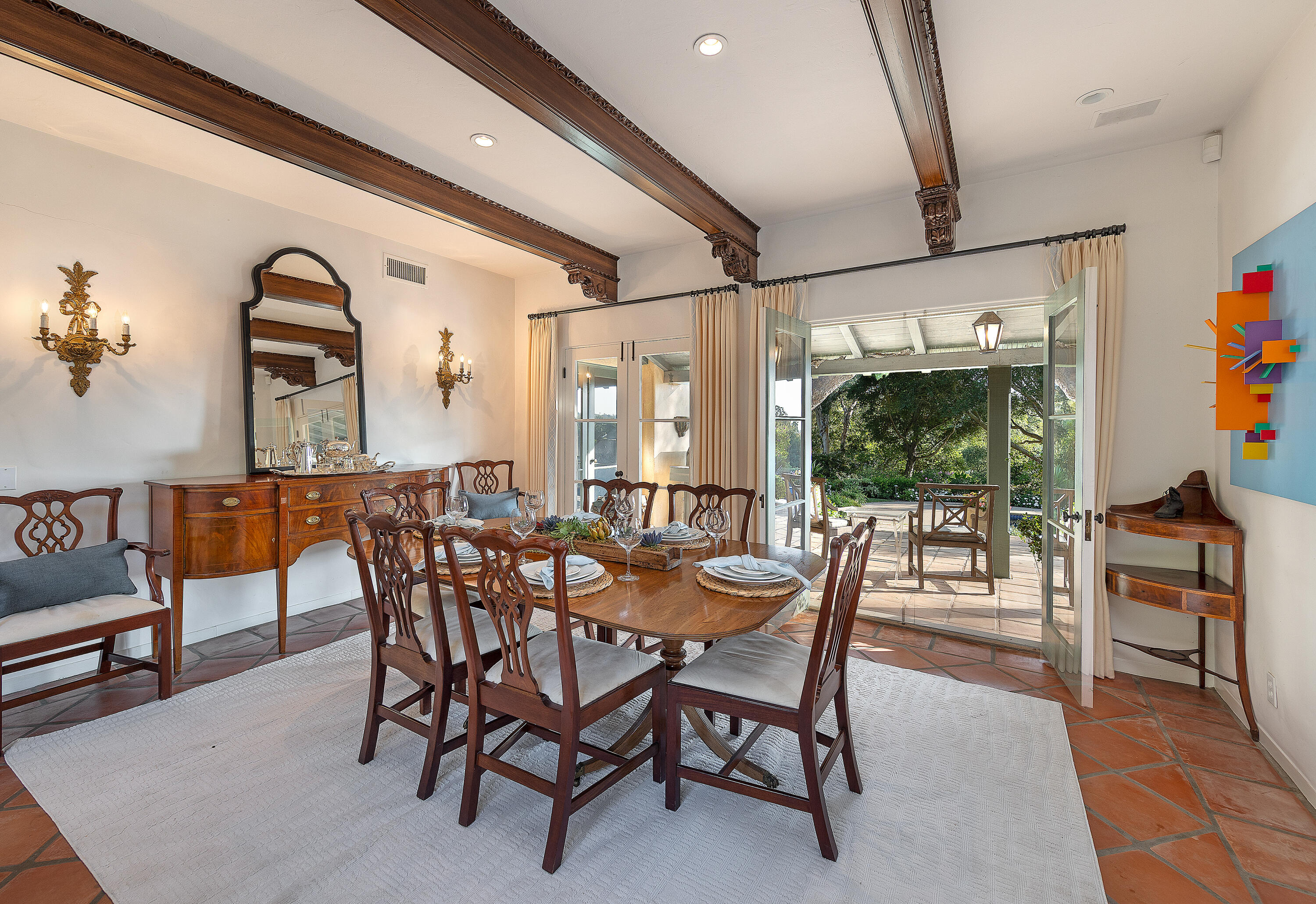 1029 Alston Road Montecito, CA 93108 - Photo 9 of 24 a dining room with furniture a rug and a painting