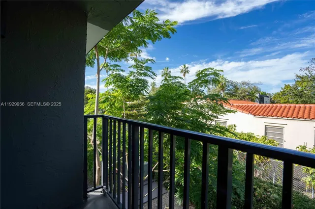 a balcony with an outdoor space