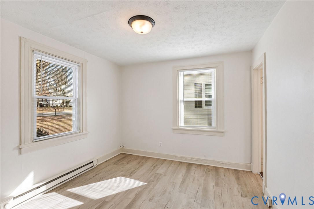 908 Rosemont Road Richmond, VA 23224 - Photo 11 of 21 an empty room with a window