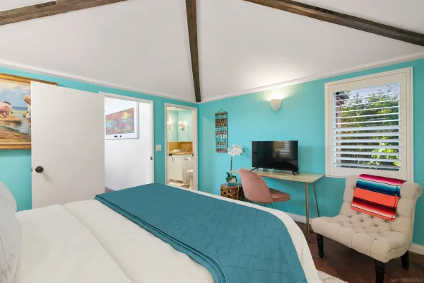 a view of a patio with table and chairs and potted plants