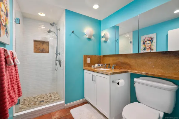 a view of a chairs and table in patio