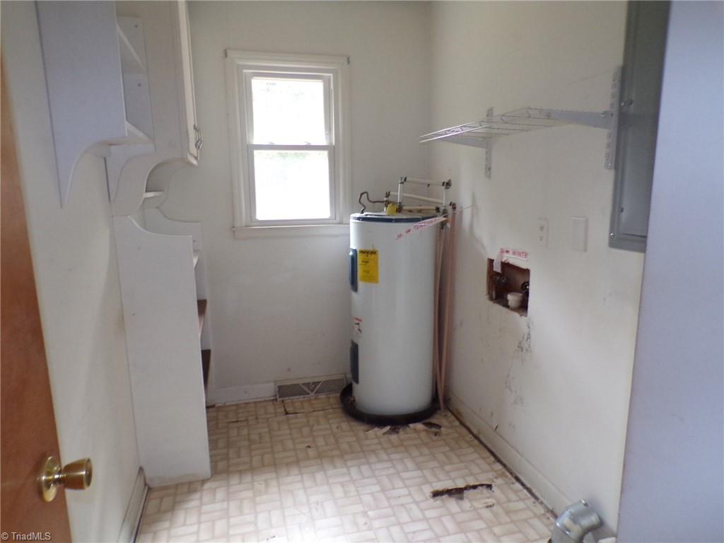 3736 Buffalo Ford Road Asheboro, NC 27205 - Photo 20 of 23 Laundry room with water heater
