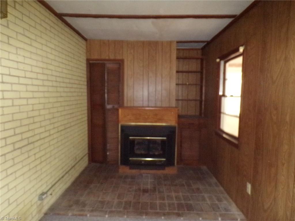 3736 Buffalo Ford Road Asheboro, NC 27205 - Photo 21 of 23 Fireplace on the breezeway