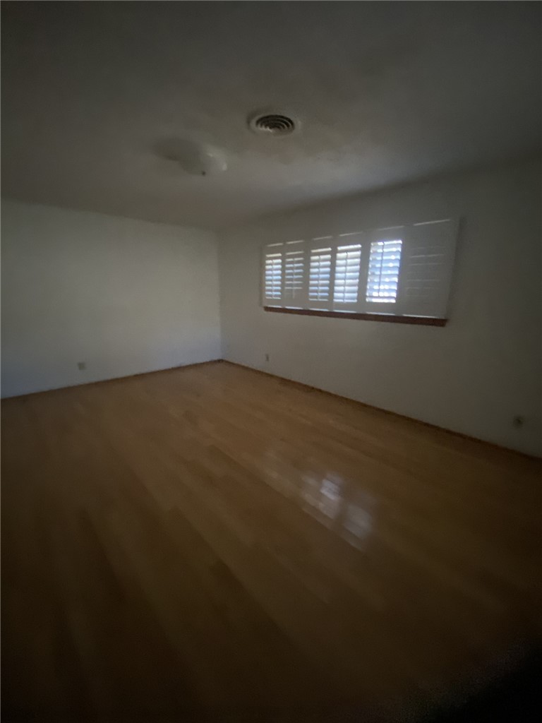 1119 Jefferson Street Alice, TX 78332 - Photo 17 of 23 a view of an empty room with a window