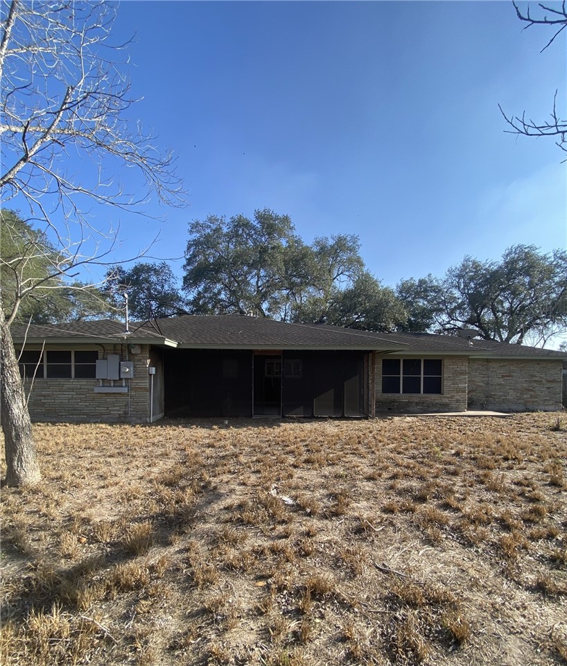1119 Jefferson Street Alice, TX 78332 - Photo 21 of 23 a front view of a house with a yard