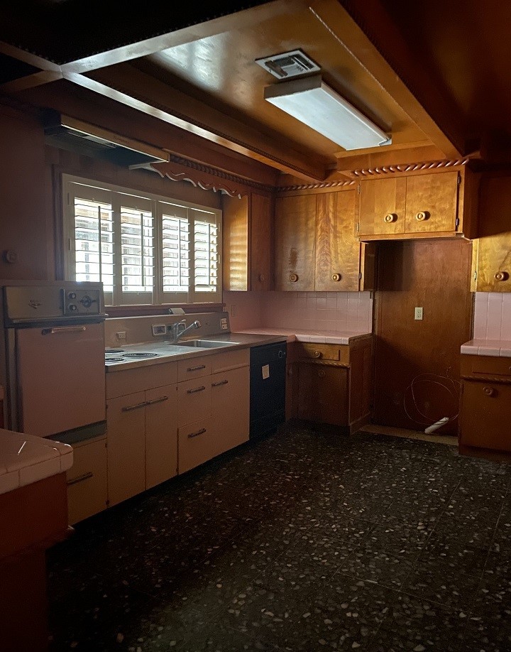 1119 Jefferson Street Alice, TX 78332 - Photo 6 of 23 a kitchen with sink and cabinets