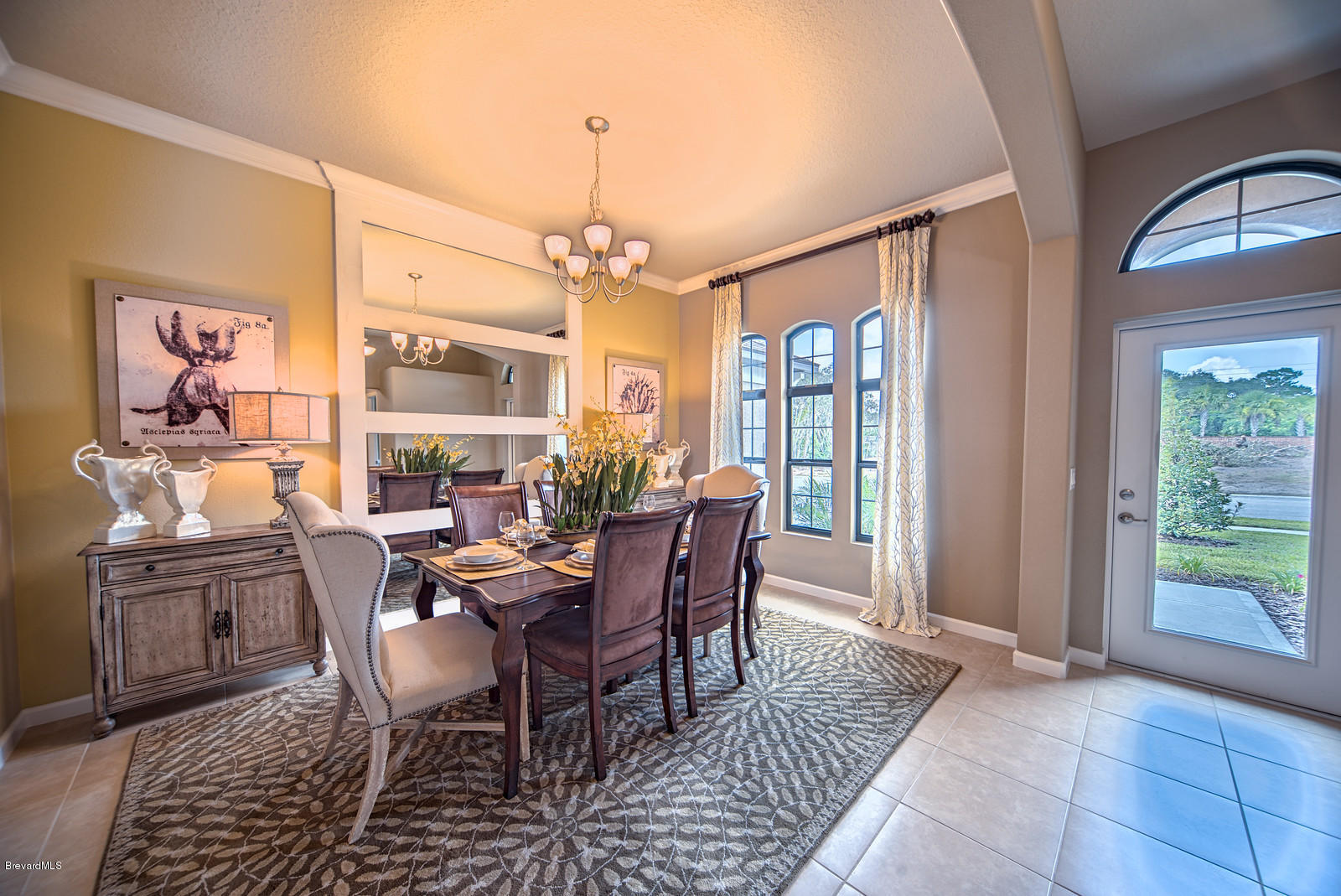 4082 Ruthann Circle Melbourne, FL 32934 - Photo 3 of 13 a view of a dining room with furniture window and outside view
