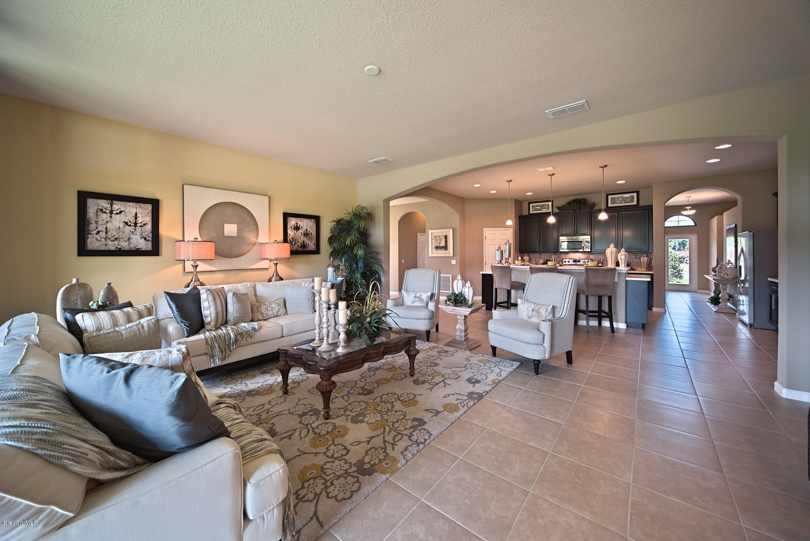 4082 Ruthann Circle Melbourne, FL 32934 - Photo 4 of 13 a living room with furniture and wooden floor
