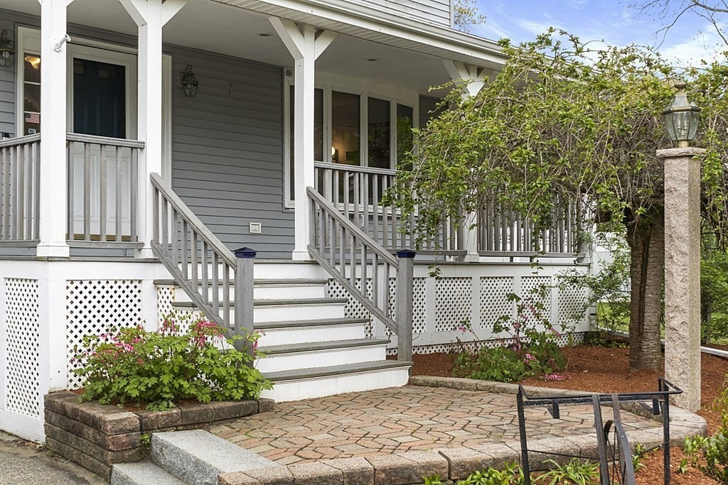 176 Southville Road Southborough, MA 01772 - Photo 2 of 39 a view of a house with a bench in patio