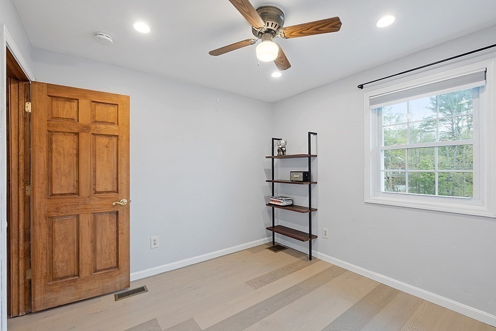176 Southville Road Southborough, MA 01772 - Photo 23 of 39 wooden floor in an empty room with a window