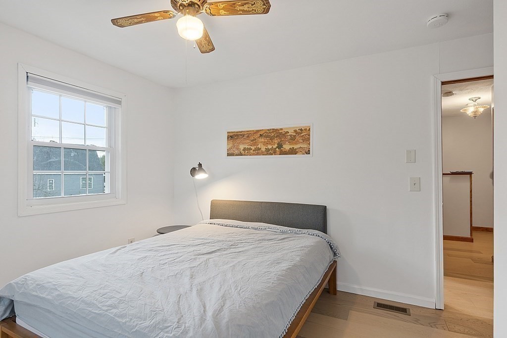176 Southville Road Southborough, MA 01772 - Photo 26 of 39 a bedroom with a large bed and a window