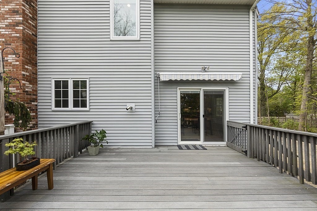 176 Southville Road Southborough, MA 01772 - Photo 30 of 39 a view of a house with a deck