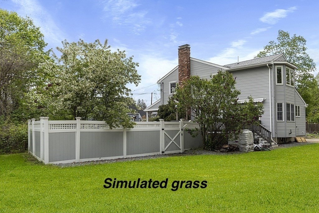176 Southville Road Southborough, MA 01772 - Photo 34 of 39 a view of a house with a backyard